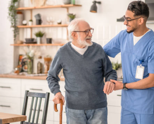 Caregiver helping an older adult walk safely at home